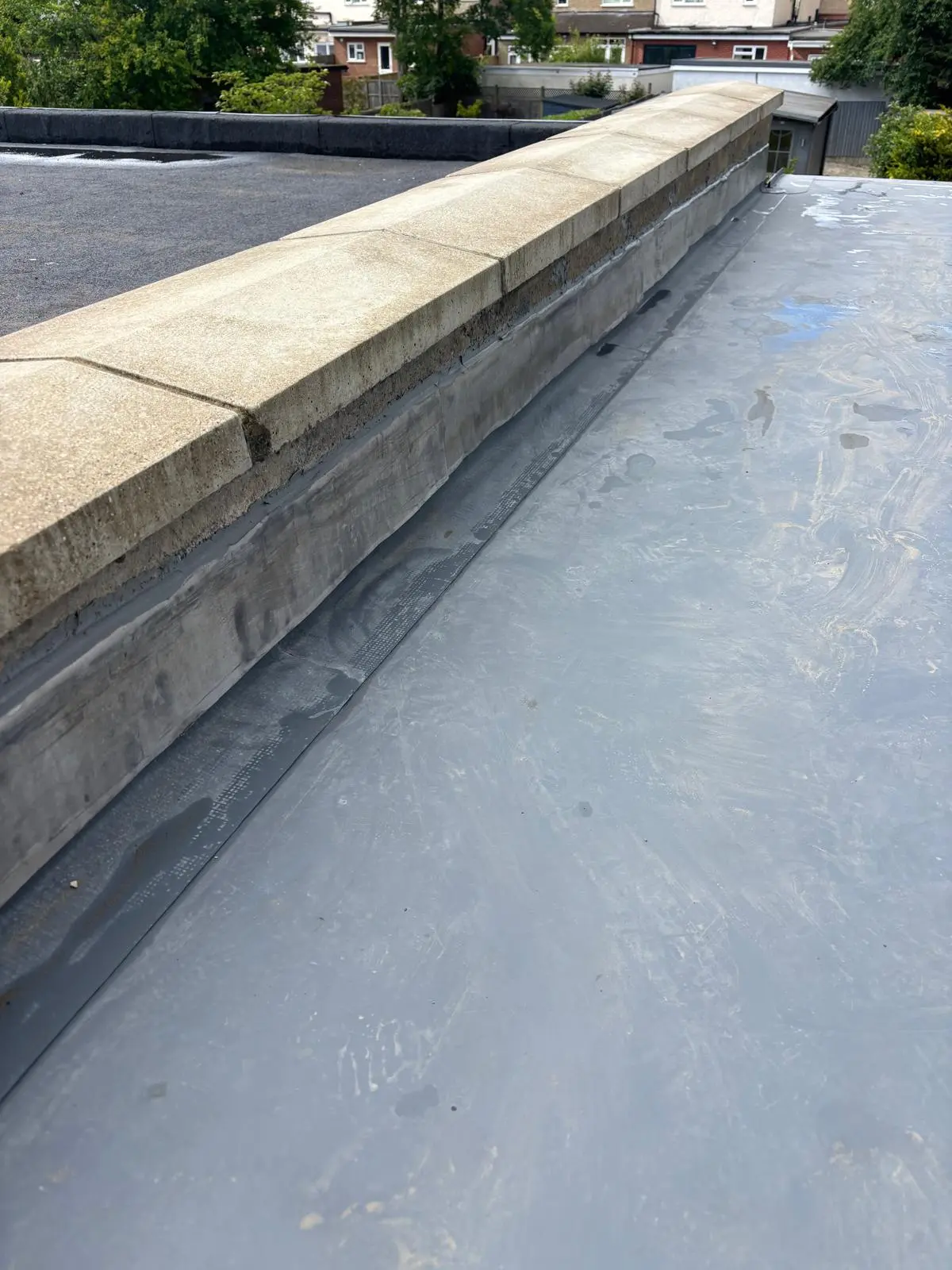 Completed roof and parapet wall repairs