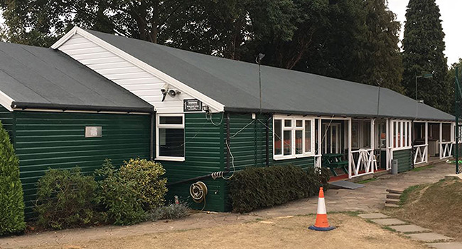 Replacing felt on adjacent section of building.